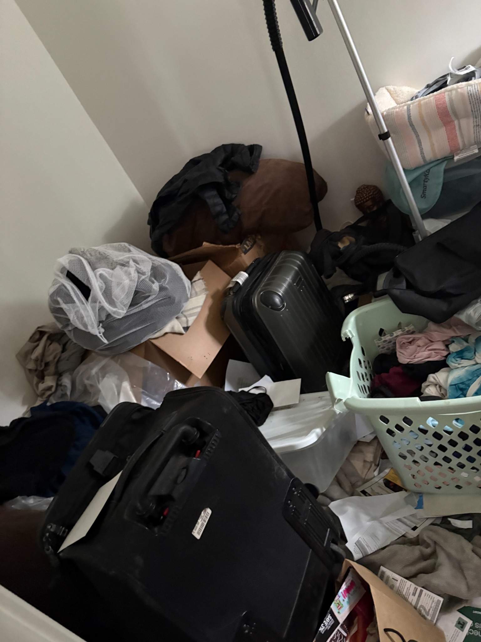 Move-out cleaning before photo showing cluttered space